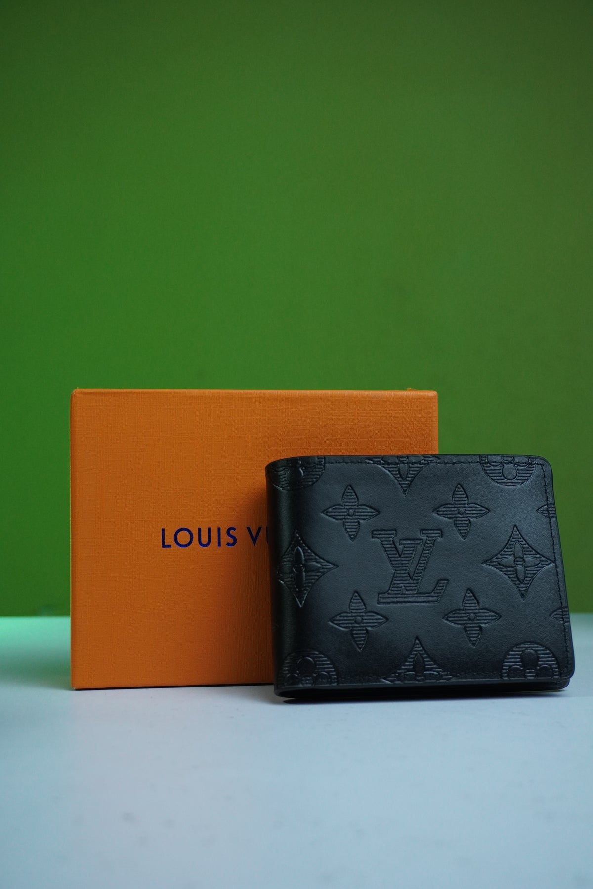 LOUIS VUITTON EMBOSSED COMPACT WALLET